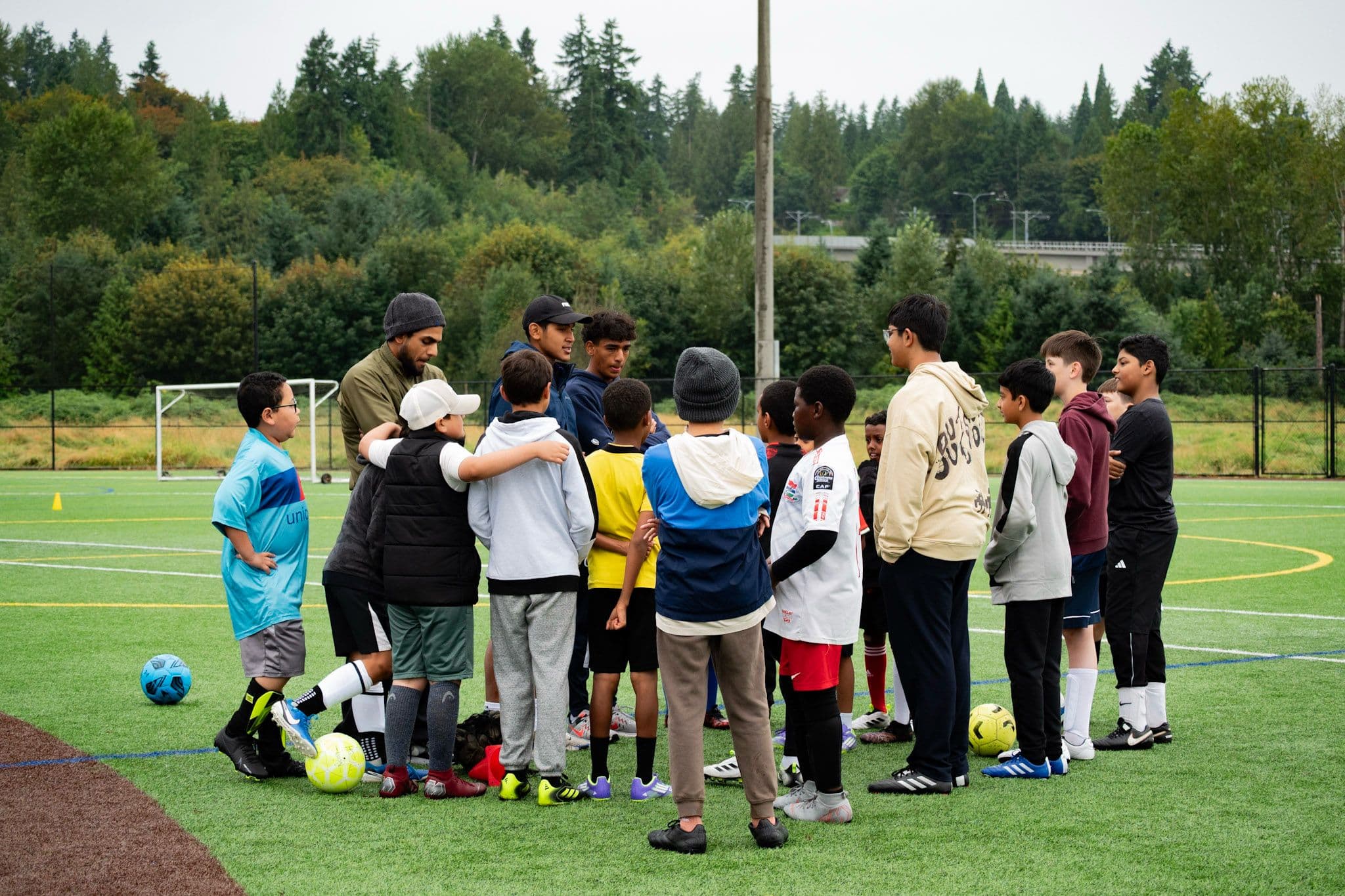 Suhbah Soccer camp training session with kids